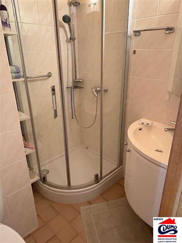 Piekfijn ingericht appartement met 1 slaapkamer met zeezicht en private garage op wandelafstand