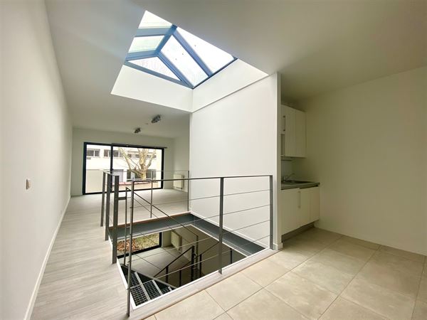 Duplex lumineux 132m2 dans maison arrière