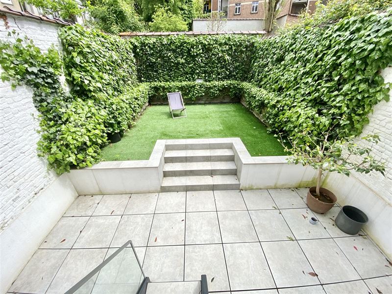 Exceptional triplex with garden