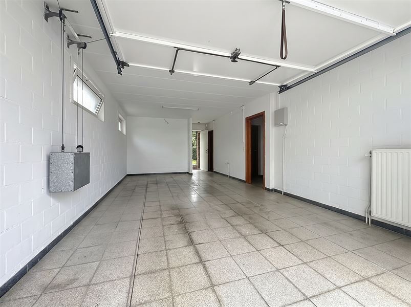Maison lumineuse avec garage et jardin