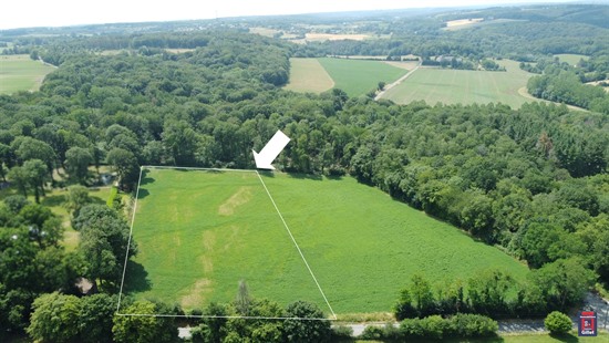 Belle parcelle de terrain en zone d'habitat et agricole
