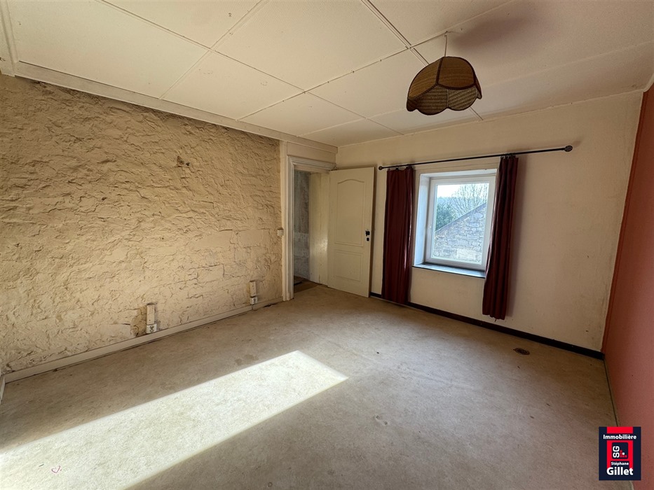 Maison en pierre au beau potentiel d’aménagement