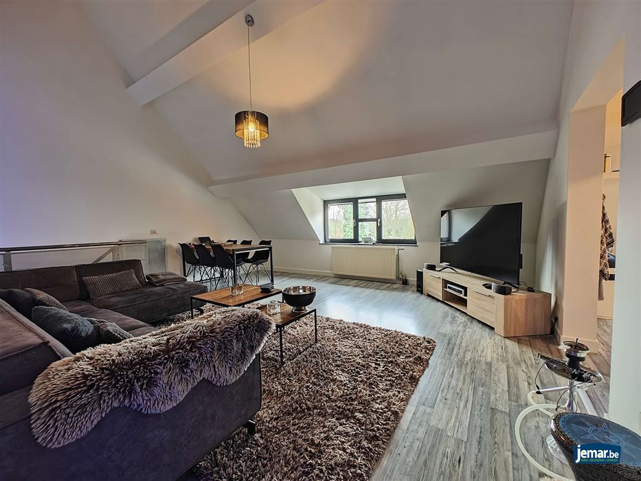 AANDELENOVERDRACHT: Handelspand met appartement