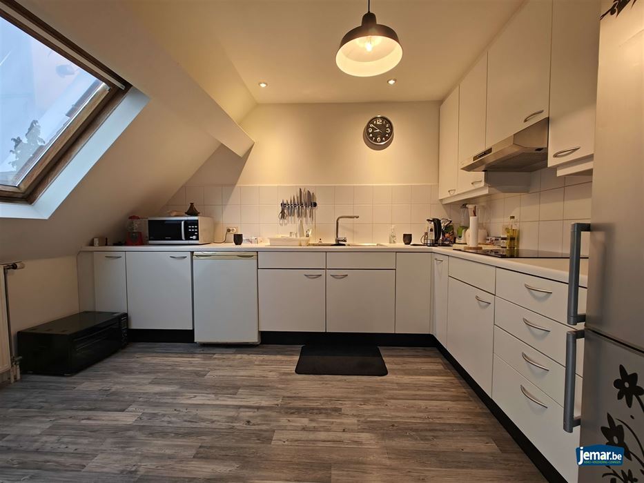 AANDELENOVERDRACHT: Handelspand met appartement