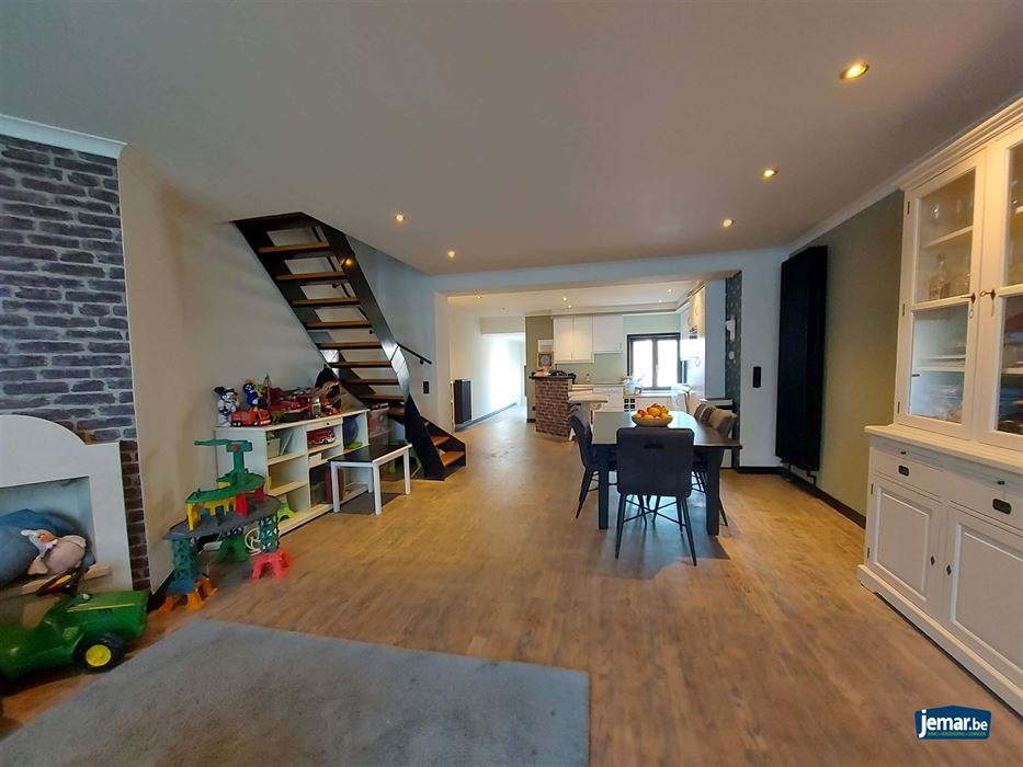 Handelspand met woonst en achteringang op de Pauwengraaf