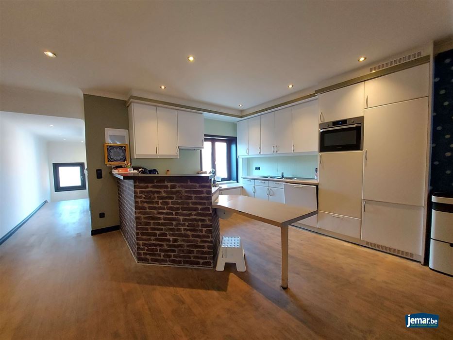 Handelspand met woonst en achteringang op de Pauwengraaf