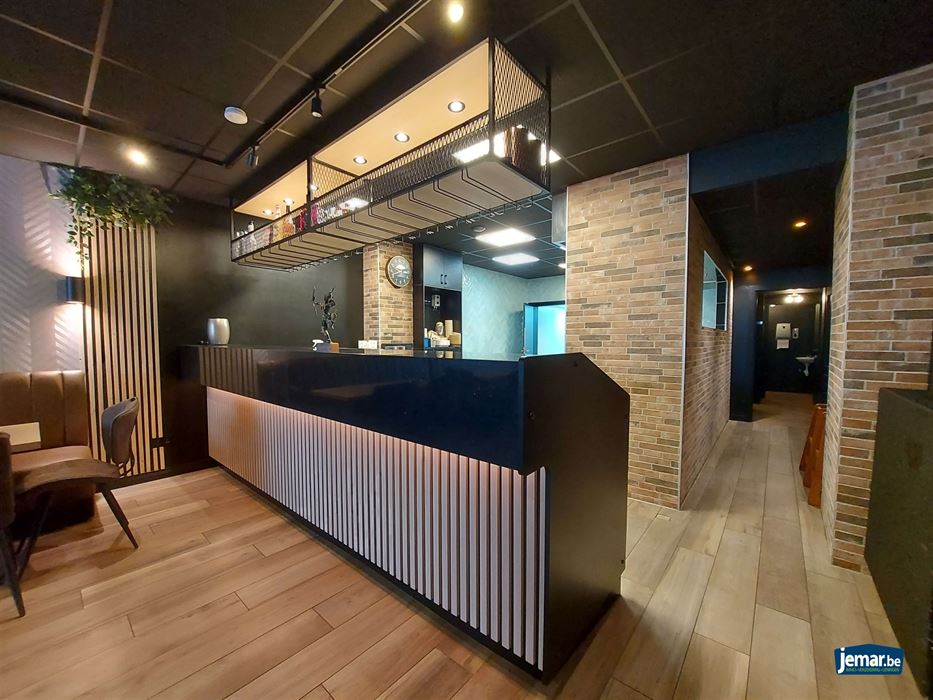 Handelspand met woonst en achteringang op de Pauwengraaf