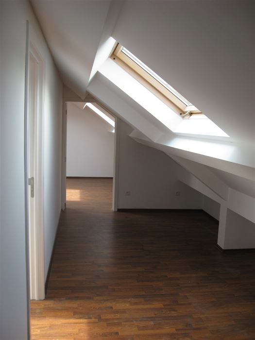 Appartementsgebouw met 2 verhuurde appartementen gelegen langs de Rijksweg!