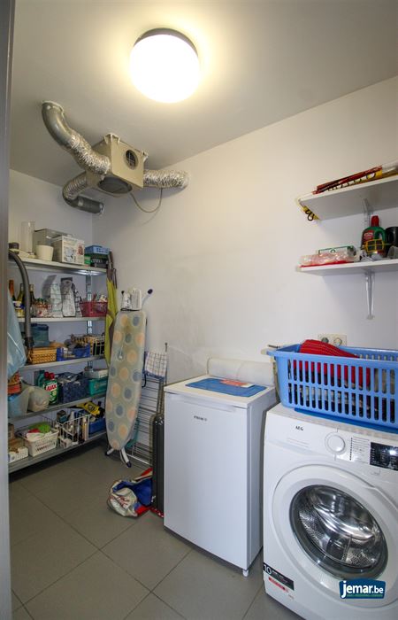 Appartement met 2 slaapkamers, overdekt terras en ondergrondse garage centraal gelegen in Maasmechelen!