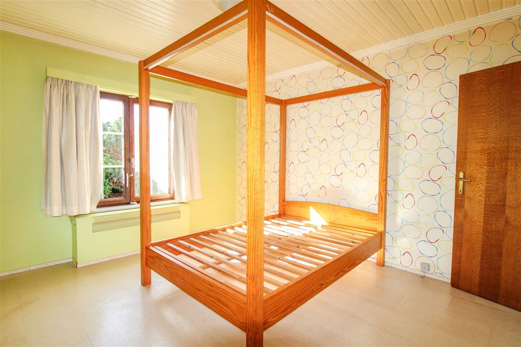 Vrijstaande woning in het groene Rekem met 4 slaapkamers, volledige onderkeldering op perceel van 7a20ca!