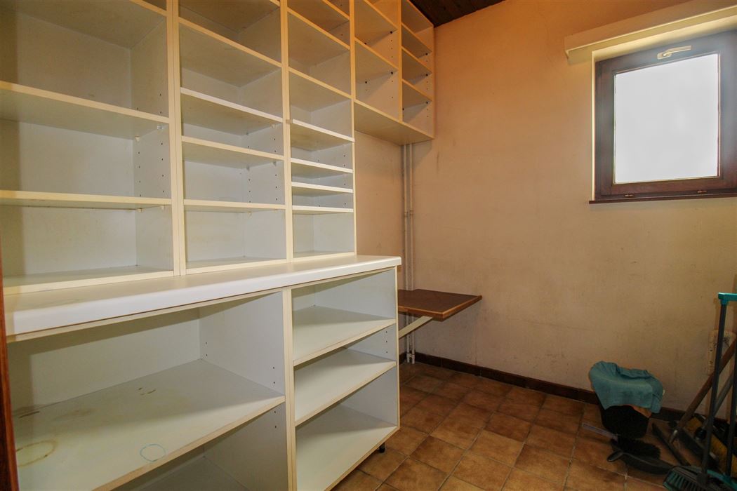 Vrijstaande woning in het groene Rekem met 4 slaapkamers, volledige onderkeldering op perceel van 7a20ca!