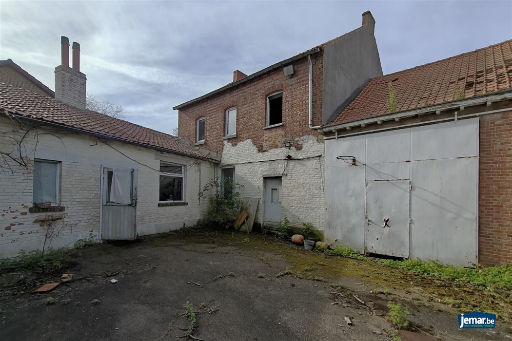 Handelspand met woonst op zeer gunstige locatie te Diepenbeek