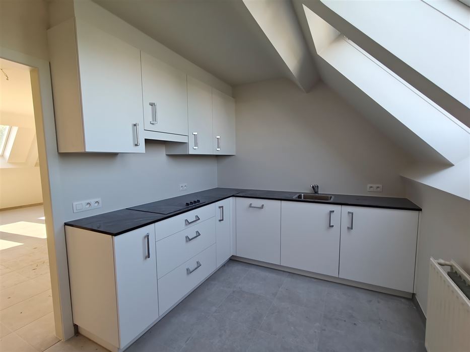 Appartement met 2 slaapkamers op bovenste verdiep