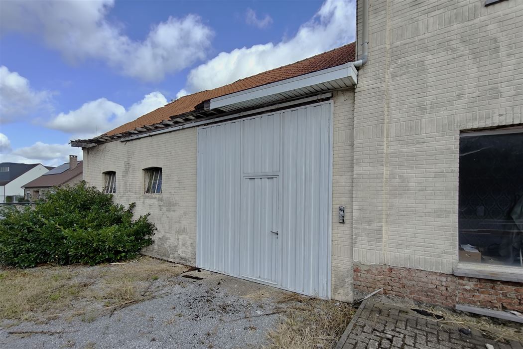 Handelspand met woonst op zeer gunstige locatie te Diepenbeek