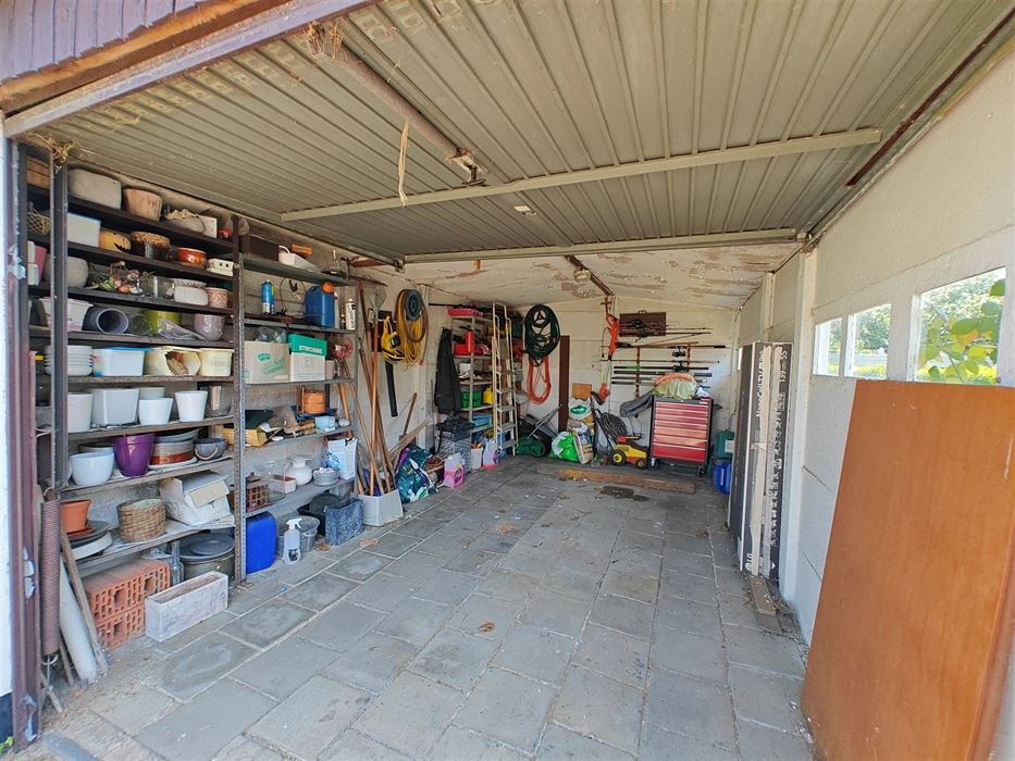 Renovatie woning met 3 slaapkamers garage en tuin