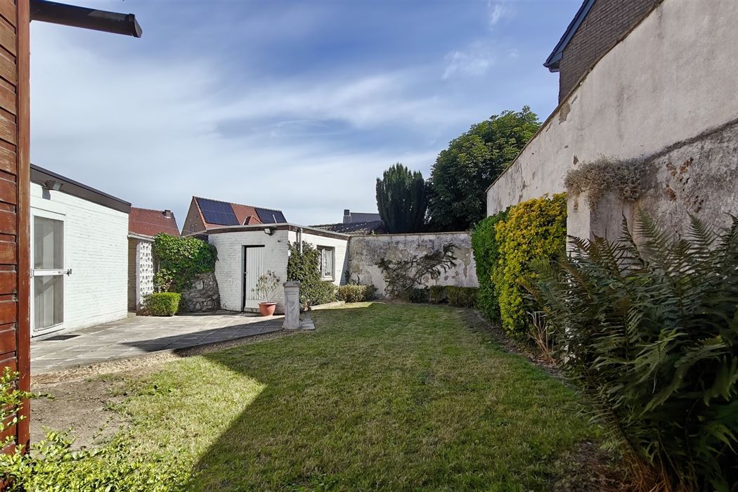 Goed onderhouden woning met 3 slpk. en 2 ingangen in Mopertingen