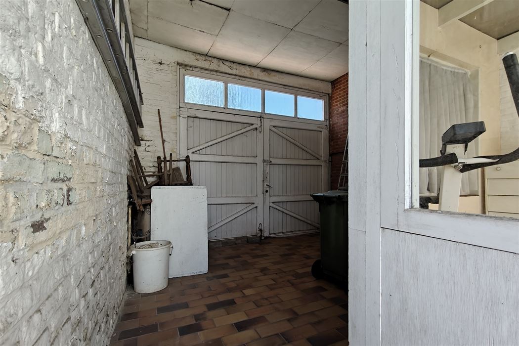 Goed onderhouden woning met 3 slpk. en 2 ingangen in Mopertingen