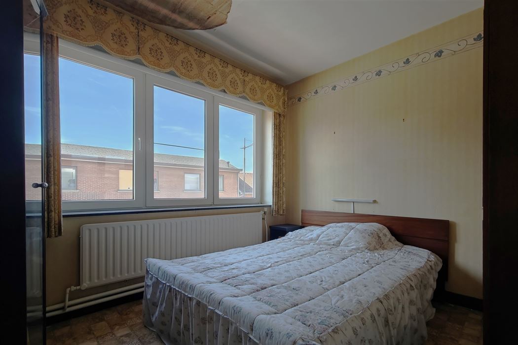 Goed onderhouden woning met 3 slpk. en 2 ingangen in Mopertingen