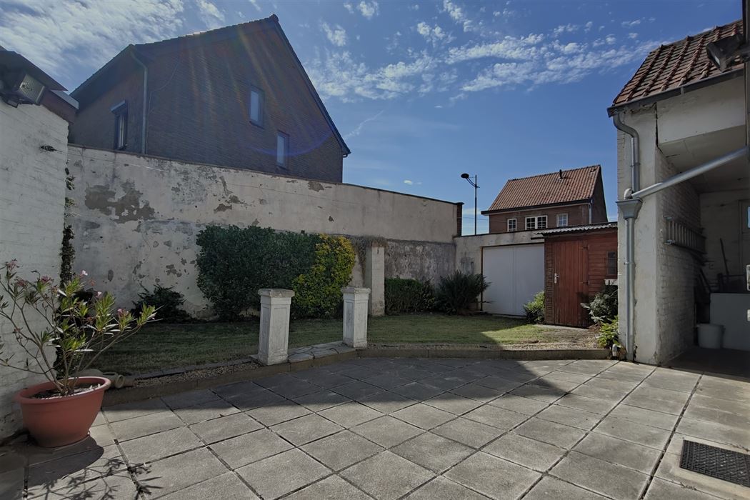 Goed onderhouden woning met 3 slpk. en 2 ingangen in Mopertingen