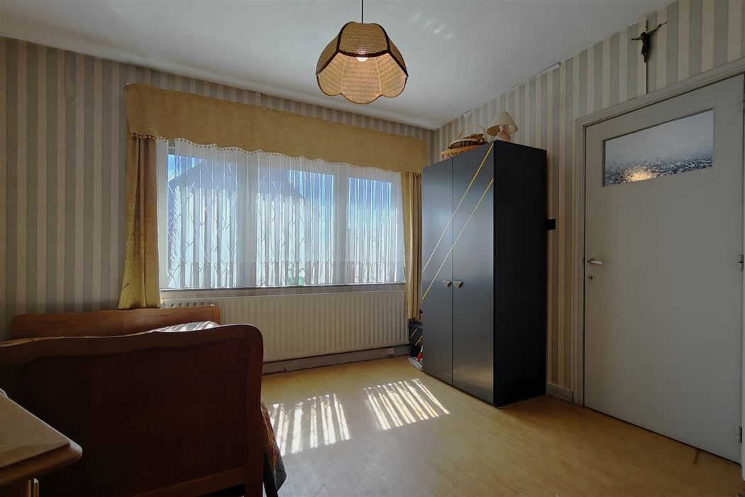 Goed onderhouden woning met 3 slpk. en 2 ingangen in Mopertingen