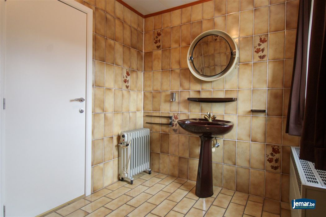 Instapklare en perfect onderhouden woning met 3 slaapkamers, 2 badkamers en een prachtige tuin van 6a74ca in hartje Maasmechelen!