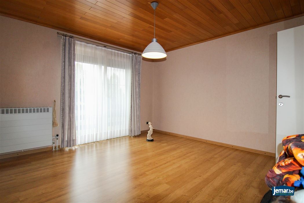 Instapklare en perfect onderhouden woning met 3 slaapkamers, 2 badkamers en een prachtige tuin van 6a74ca in hartje Maasmechelen!