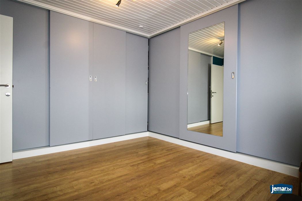 Instapklare en perfect onderhouden woning met 3 slaapkamers, 2 badkamers en een prachtige tuin van 6a74ca in hartje Maasmechelen!