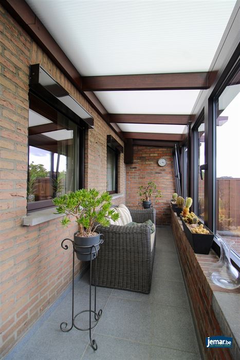 Instapklare en perfect onderhouden woning met 3 slaapkamers, 2 badkamers en een prachtige tuin van 6a74ca in hartje Maasmechelen!