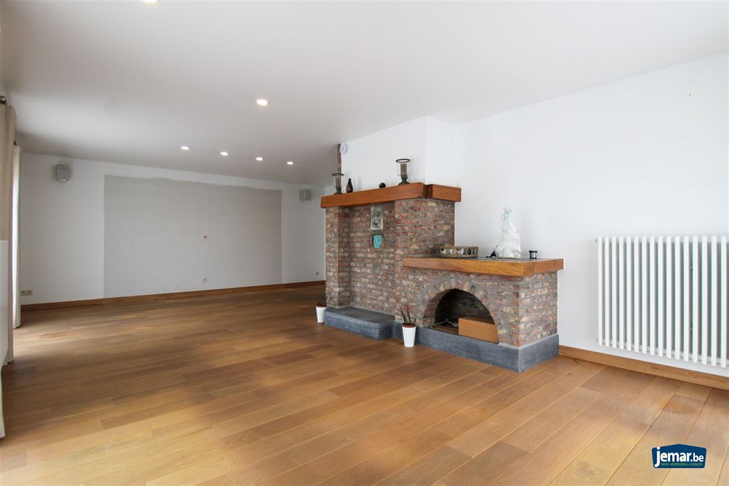 Instapklare en perfect onderhouden woning met 3 slaapkamers, 2 badkamers en een prachtige tuin van 6a74ca in hartje Maasmechelen!