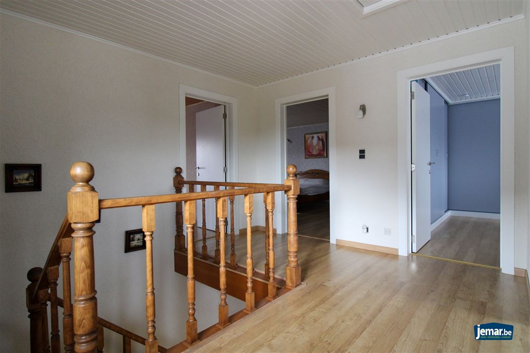 Instapklare en perfect onderhouden woning met 3 slaapkamers, 2 badkamers en een prachtige tuin van 6a74ca in hartje Maasmechelen!