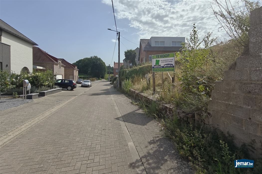 Bouwgrond met goedgekeurde plannen voor open bebouwing (4a36ca) in het landelijke Genoelselderen