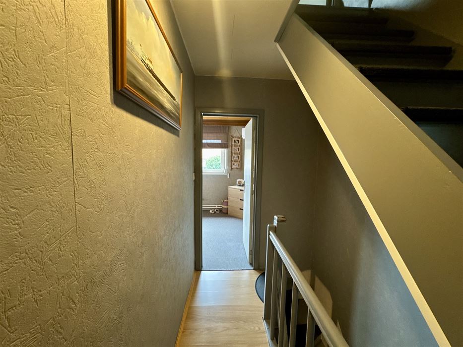 Instapklare halfopen mijnwerkerswoning te koop