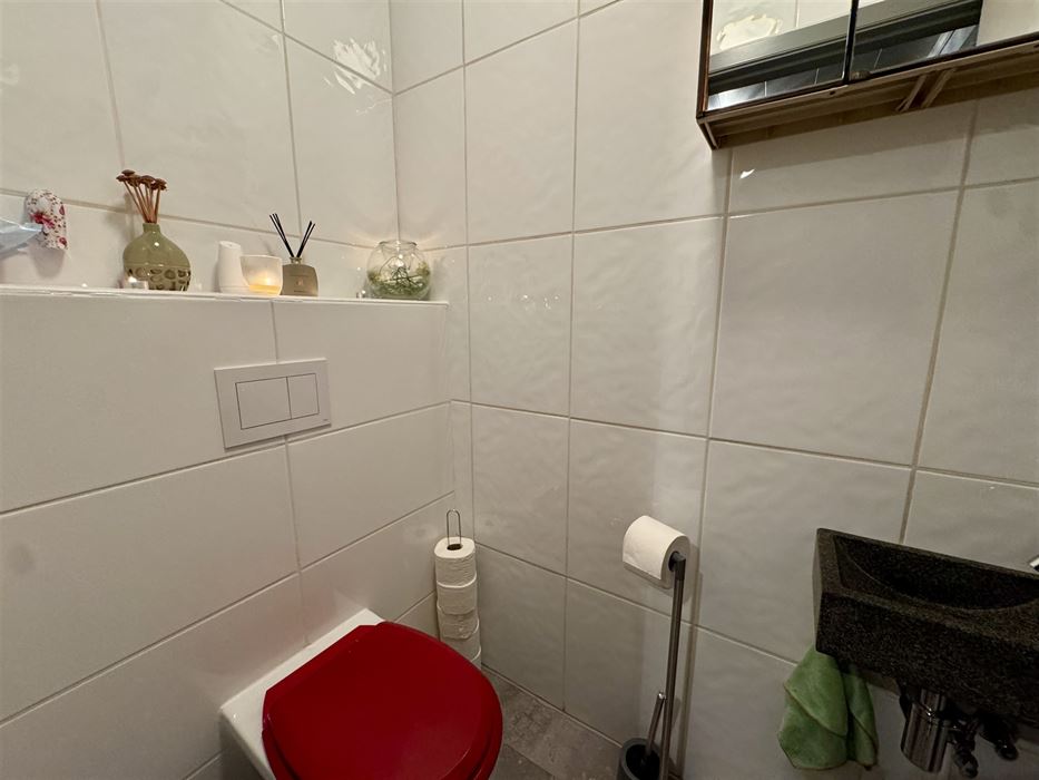 Instapklare halfopen mijnwerkerswoning te koop