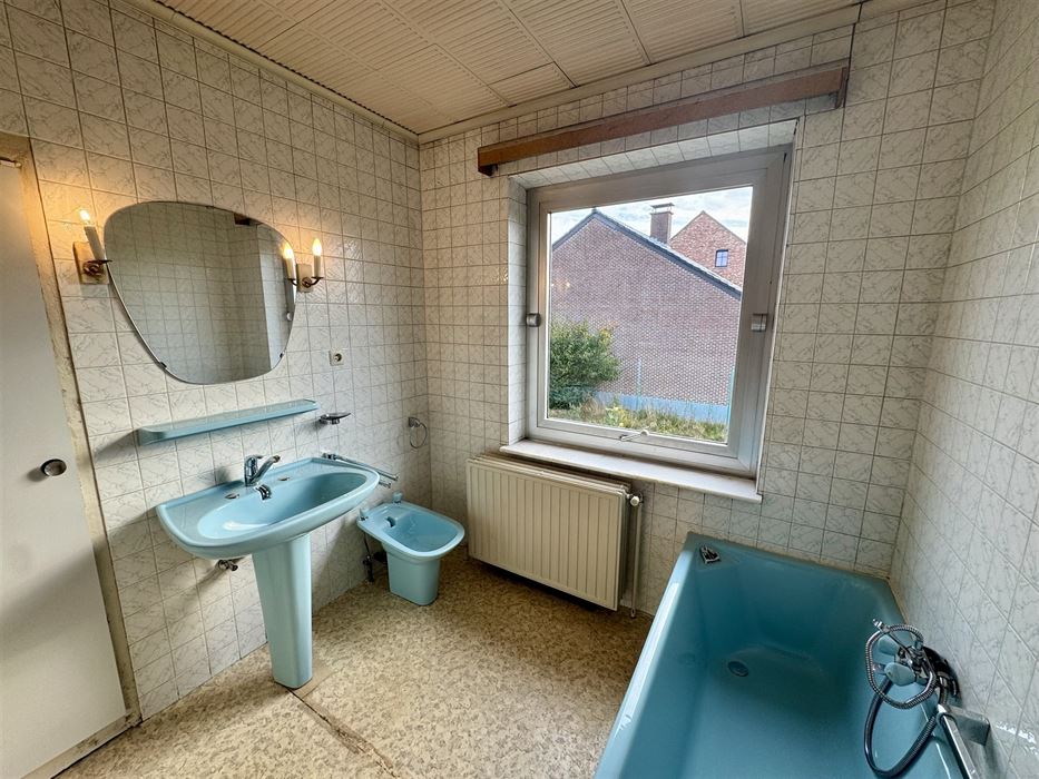 Vrijstaande splitlevelwoning met tuin te Meeswijk.