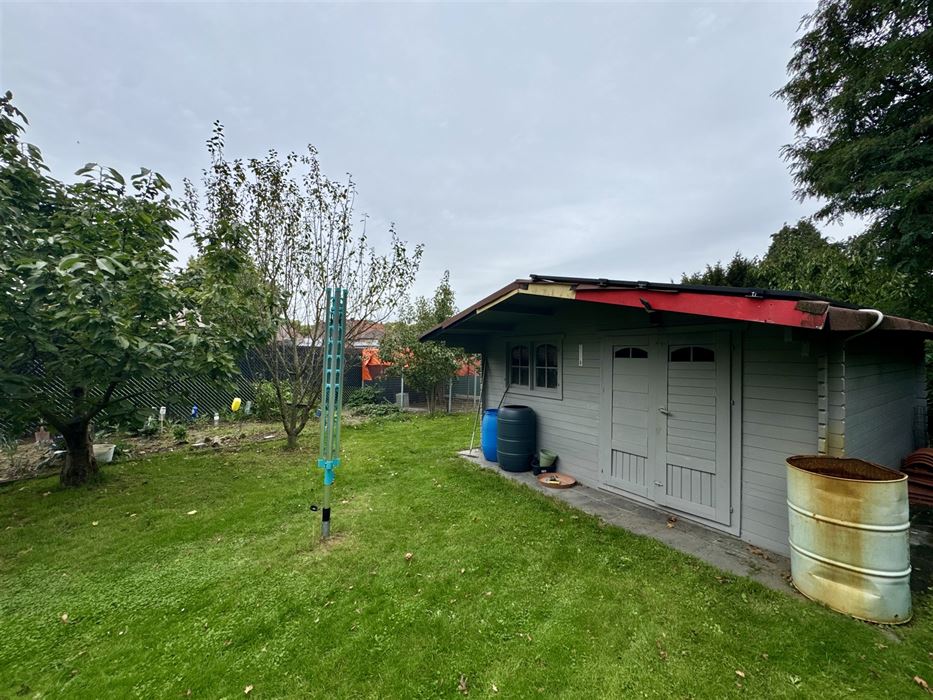 Instapklare halfopen mijnwerkerswoning te koop