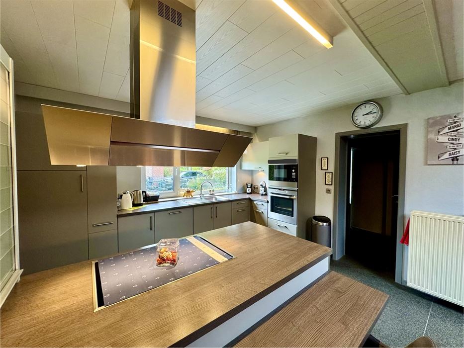 Instapklare halfopen mijnwerkerswoning te koop