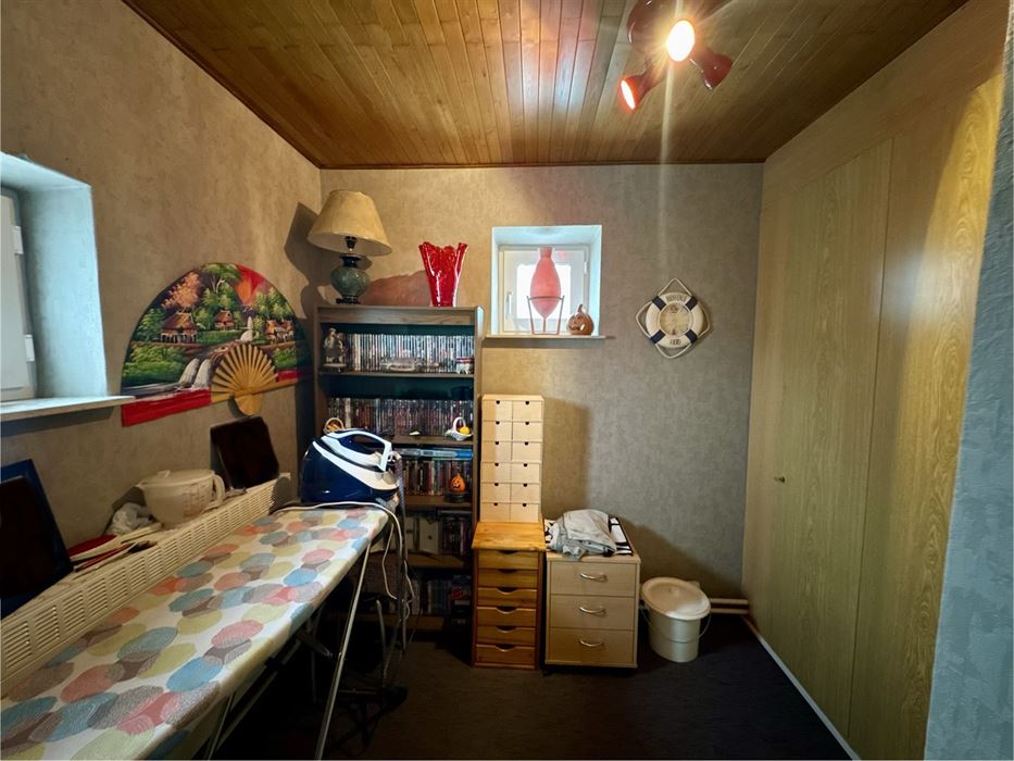 Instapklare halfopen mijnwerkerswoning te koop