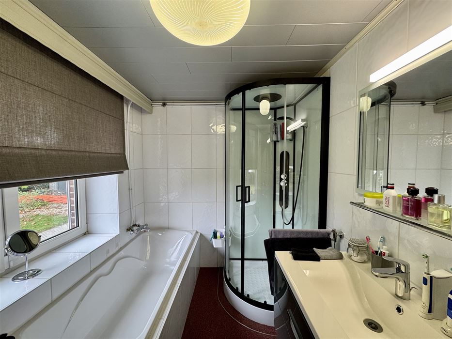 Instapklare halfopen mijnwerkerswoning te koop