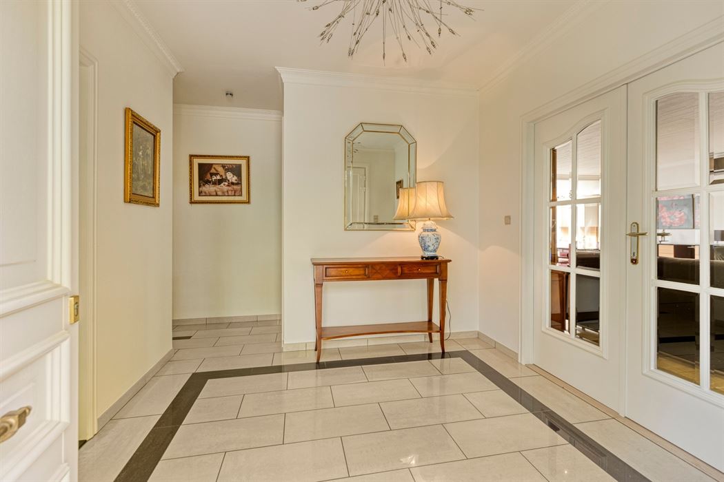 Vrijstaande villa van 306 m² op 17a95ca, gelegen vlak bij Connecterra, de toegangspoort tot het Nationaal Park Hoge Kempen, en op wandelafstand van Maasmechelen Village!