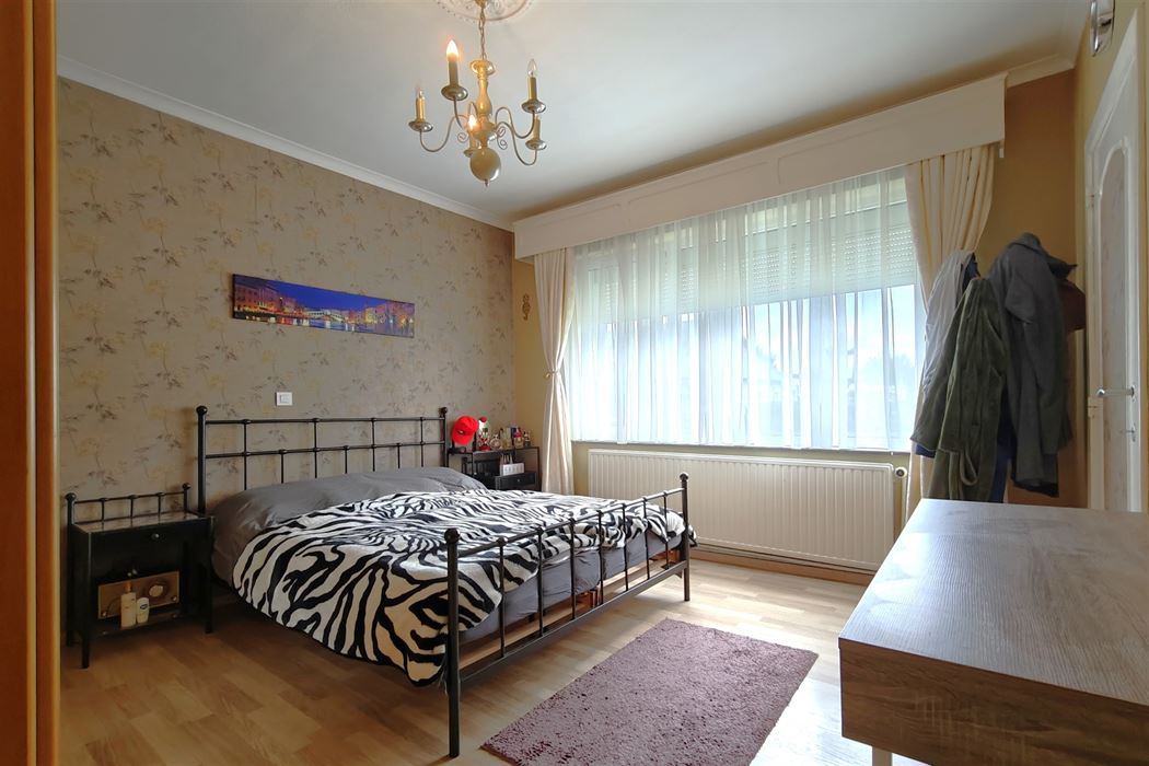 Statige woning op 9a15ca met 4 slpk. in verzorgde woonwijk te Kesselt