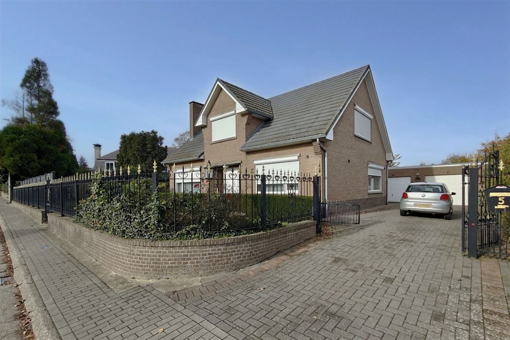 Statige woning op 9a15ca met 4 slpk. in verzorgde woonwijk te Kesselt