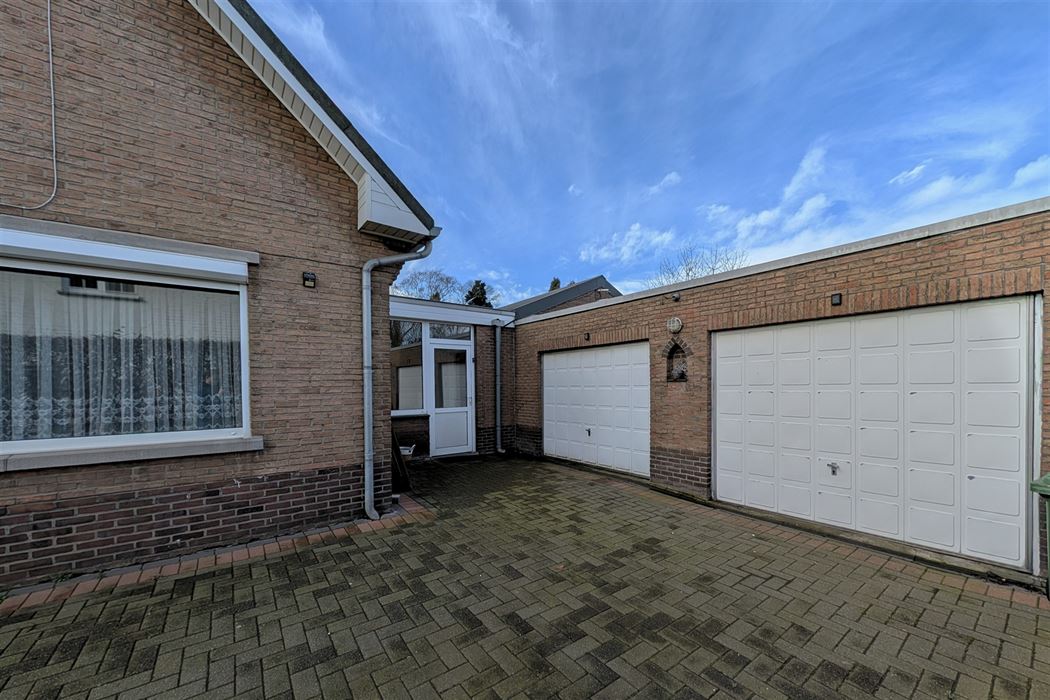 Statige woning op 9a15ca met 4 slpk. in verzorgde woonwijk te Kesselt