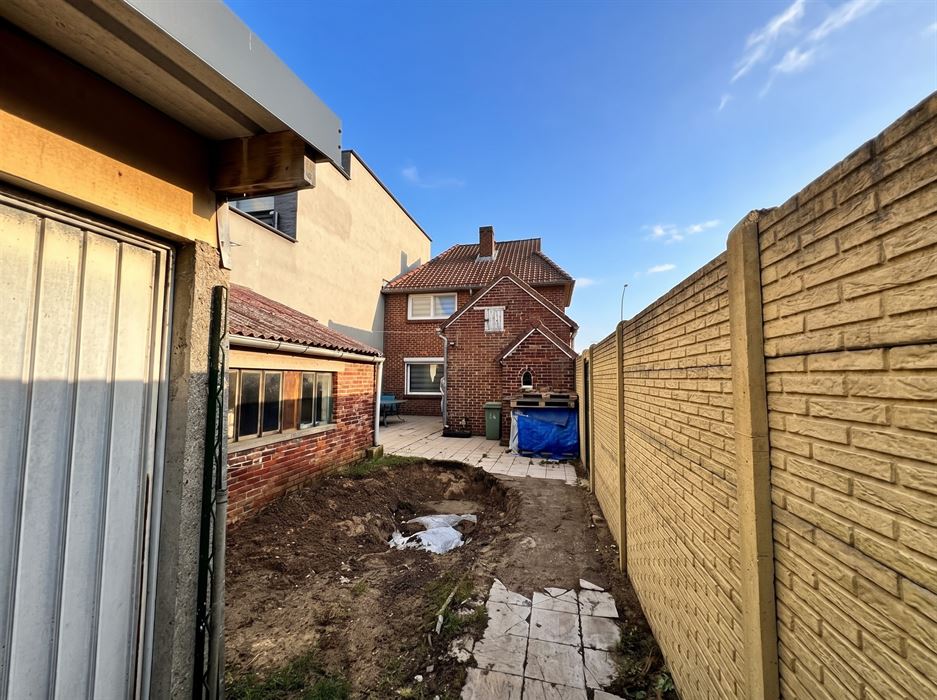Halfopen bebouwing te koop