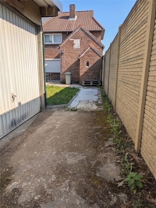 Halfopen bebouwing te koop