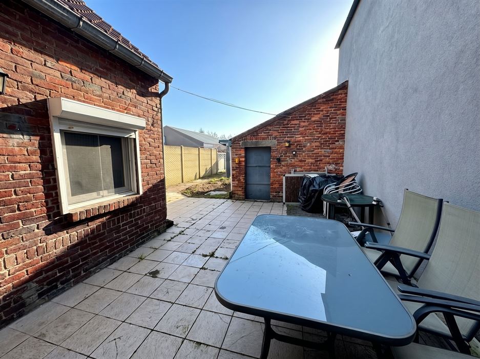 Halfopen bebouwing te koop