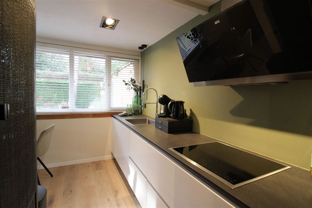 Instapklare gelijkvloerse vakantiewoning met twee slaapkamers, moderne keuken en een volledig afgesloten perceel op vakantiedomein Sonnevijver!