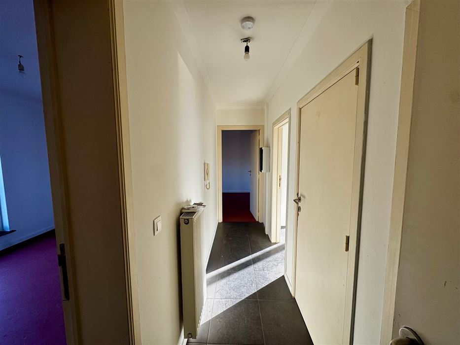 Opbrengsteigendom: handelspand met 2 appartementen