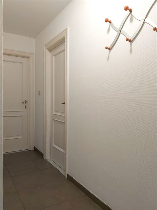 Gelijkvloers appartement met 2 slaapkamers, autostaanplaats en kelderberging in Maasmechelen!