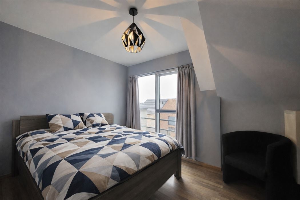 Instapklaar duplex appartement met terras en ondergrondse garage op steenworp van Hasselt centrum