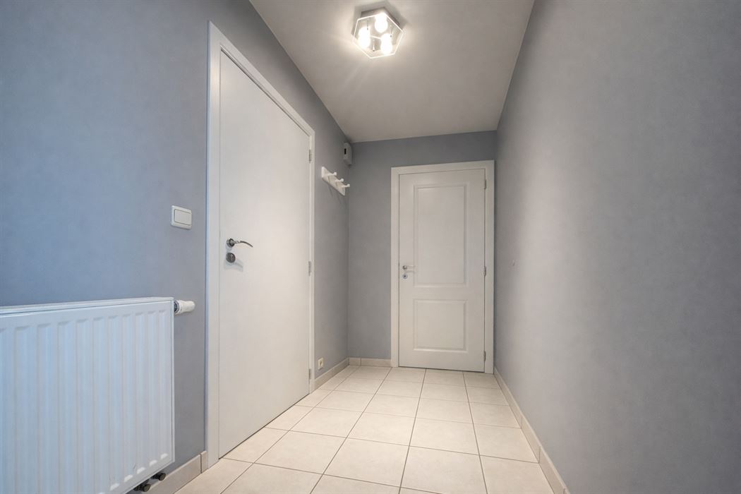 Instapklaar duplex appartement met terras en ondergrondse garage op steenworp van Hasselt centrum